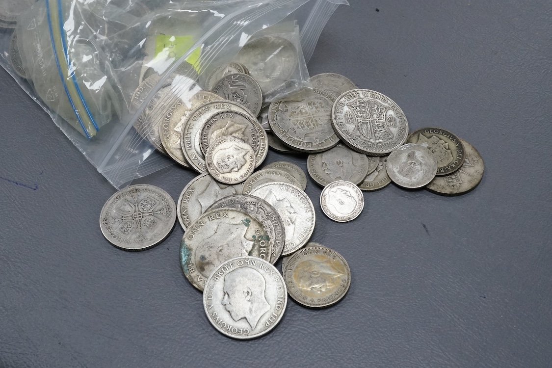A collection of coins including pre 1947 Halfcrowns, Florins, shillings etc.